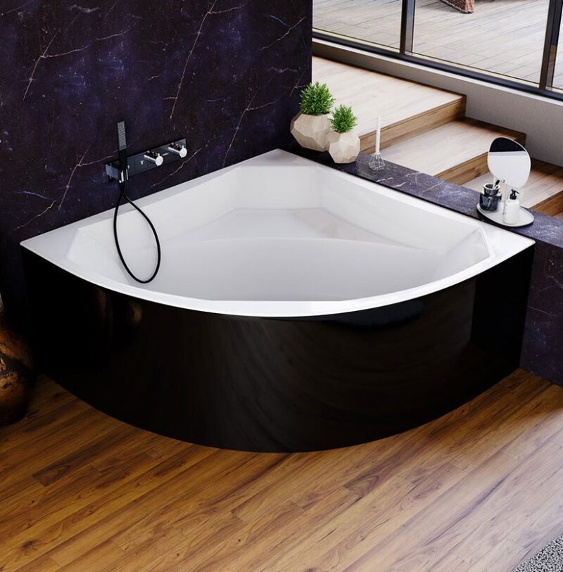 Modern corner bathtub with black exterior and white interior, chrome faucet and handheld shower in a stylish bathroom with dark marble wall and wooden floor.